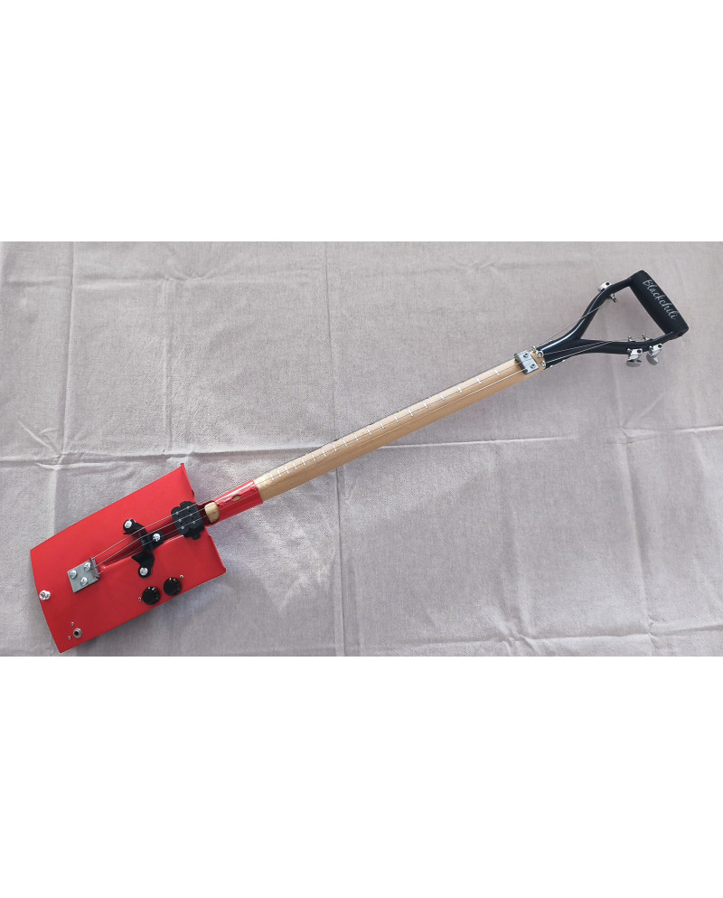 Spade guitar-Guitare bêche -Shovel guitar Fiesta orange finish